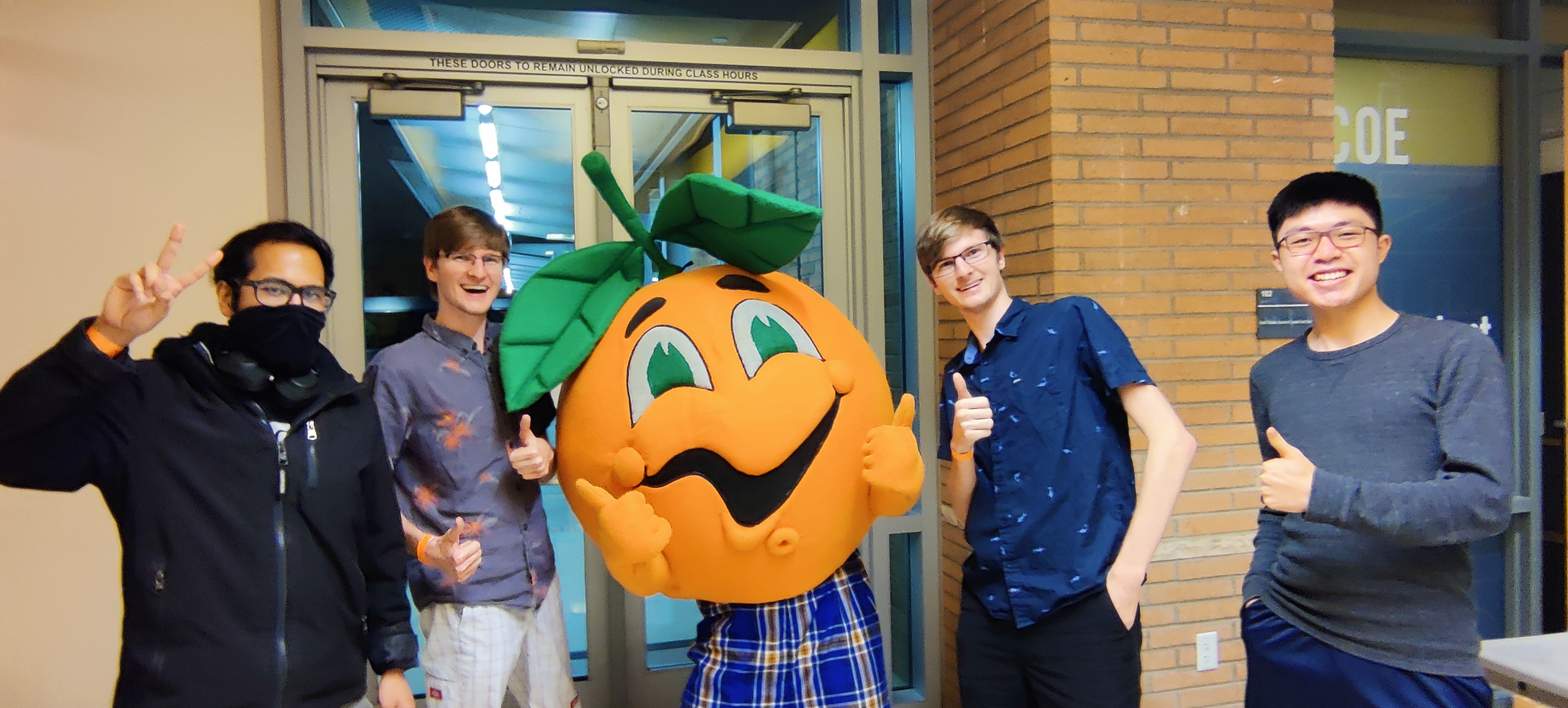 A group photo with Norm the Navel, the other mascot of UCR